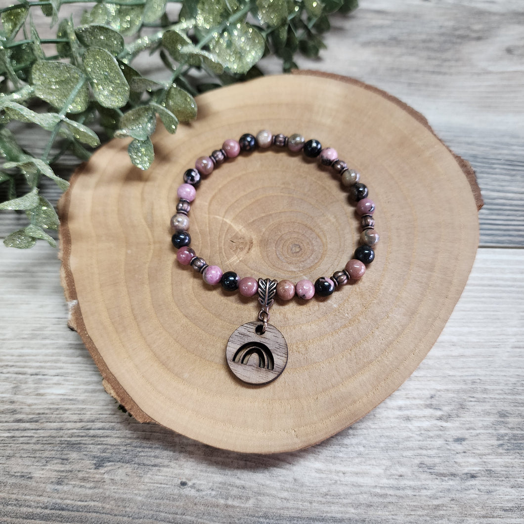 Rhodonite bracelet with walnut rainbow pendant