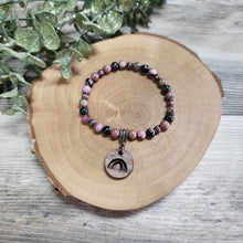 Load image into Gallery viewer, Rhodonite bracelet with walnut rainbow pendant
